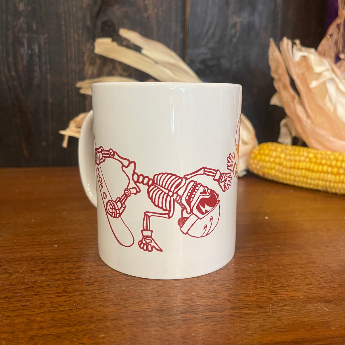 MiOle coffee mug with a white ceramic body and a sturdy handle, featuring a sleek, minimalist design.