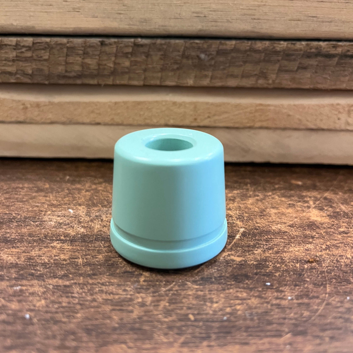 Metal Razor Stand by Ningbo Haward Razor, sleek and sturdy holder for safety razors, displayed on a clean surface.