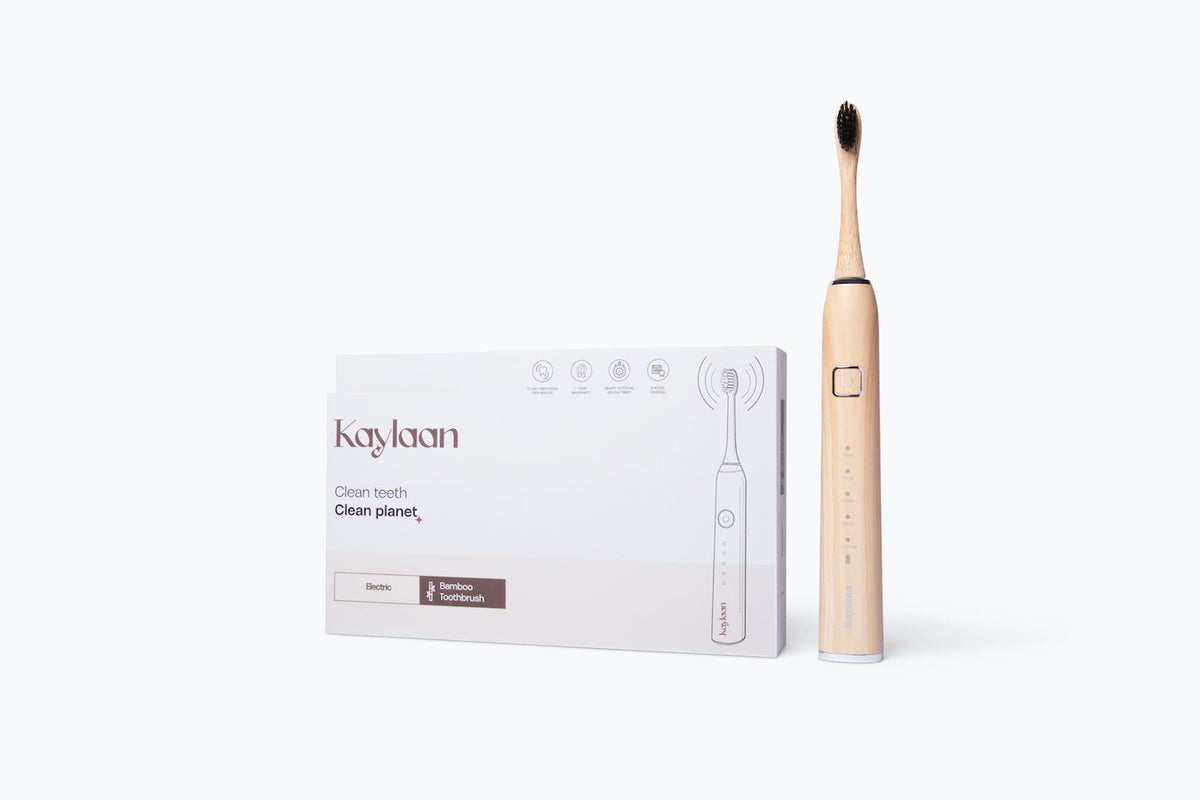Kaylaan electric bamboo toothbrush, rechargeable with sleek design and bamboo handle, suitable for eco-friendly oral care.