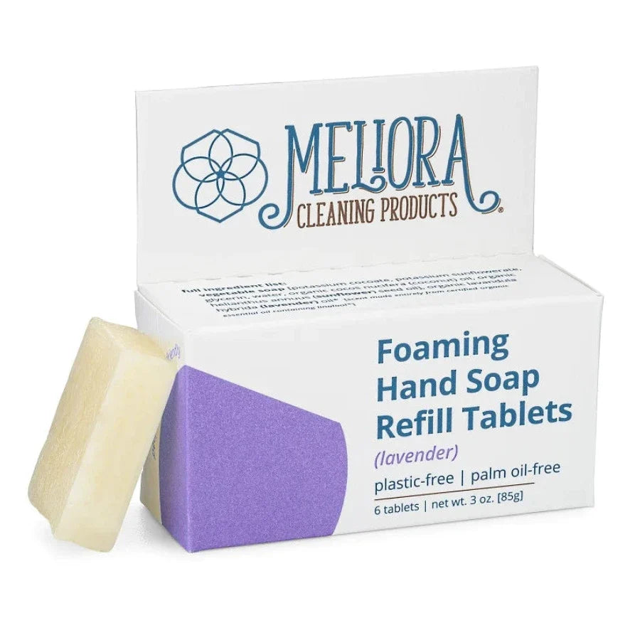 Meliora lavFoam hand soap refill tablets in a white container, ready to be dissolved into foaming hand soap.