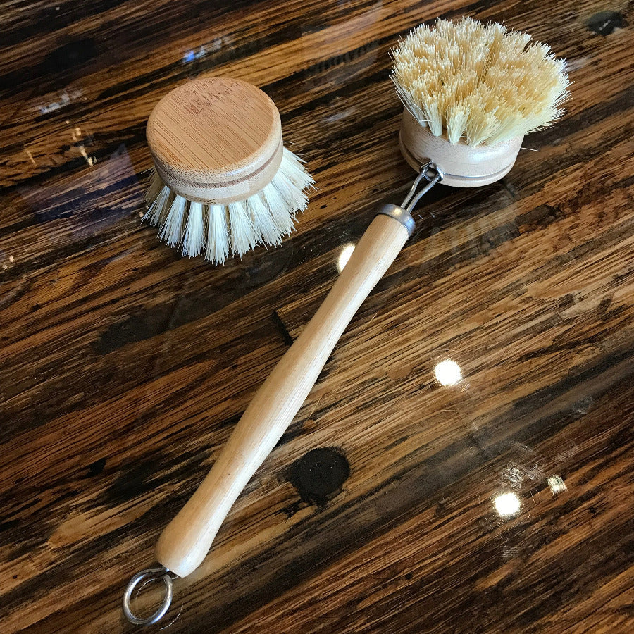 OTB Refills bamboo kitchen dish scrubber with long handle and replaceable brush head for easy cleaning.