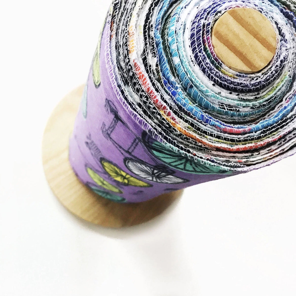 Rolled Marley’s UNpaper Towels by Marley's Monsters, reusable eco-friendly paper towel alternatives on a roll.