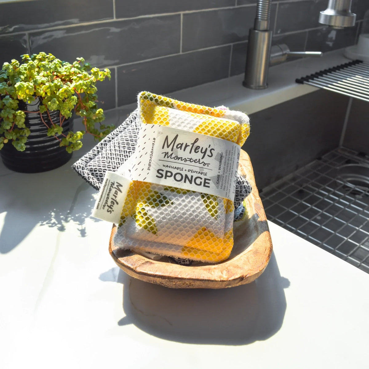 Washable, reusable Marley’s Monsters sponge with a soft, textured surface for eco-friendly cleaning.
