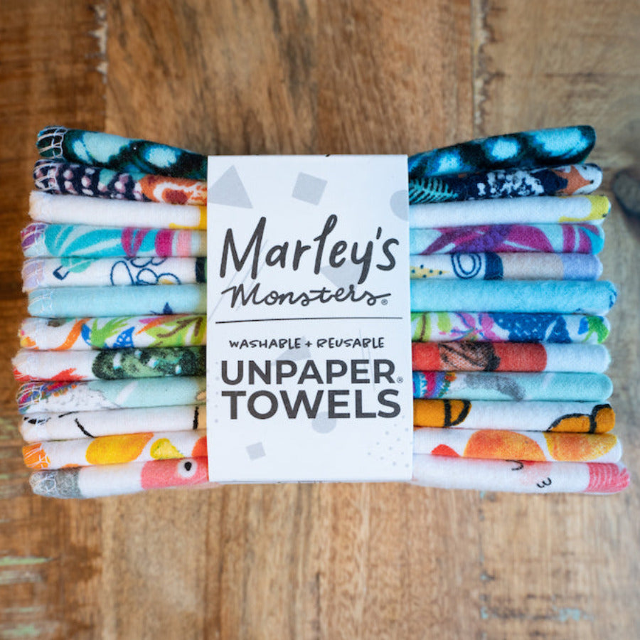 Stack of 12 Marley’s Monsters UNpaper Towels with colorful surprise print designs, eco-friendly reusable paper towel alternatives.