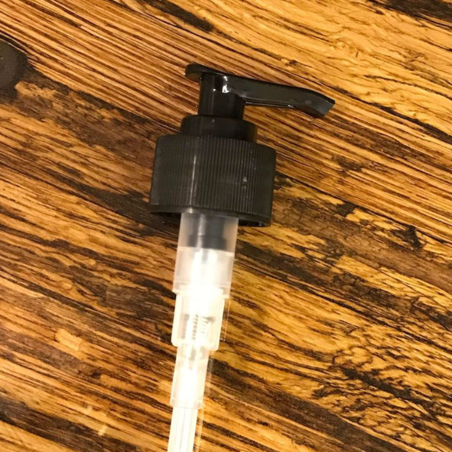 Black plastic lotion and soap pump from Premium Vials, suitable for 8 or 16 oz bottles, with a sleek, functional design.