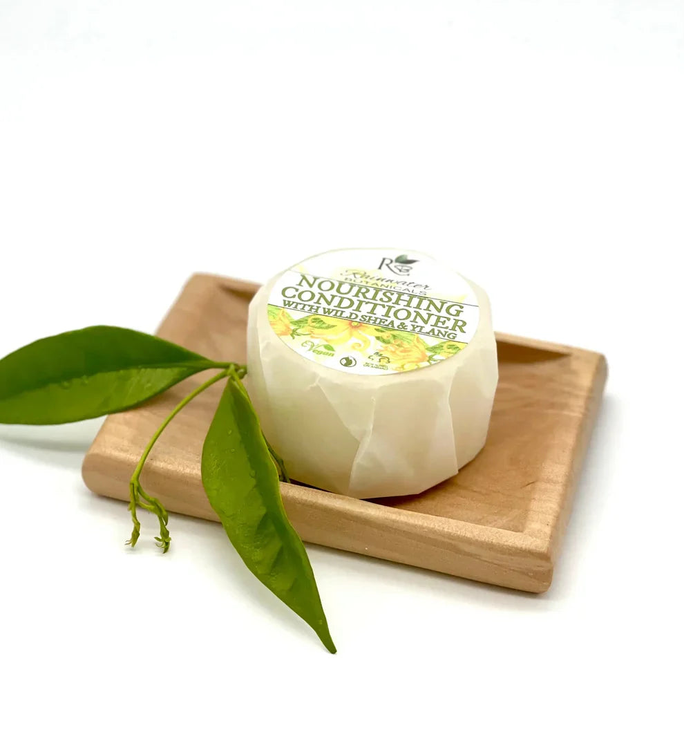 Rainwater Botanicals Nourishing Solid Conditioner Bar, zero-waste hair care product with natural ingredients and eco-friendly packaging.