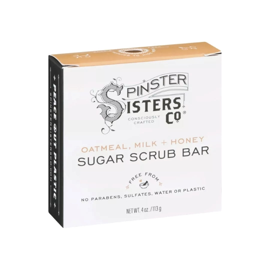 Spinster Sisters oatmeal milk honey sugar scrub bar showing a natural, textured soap bar with honey and oatmeal ingredients.