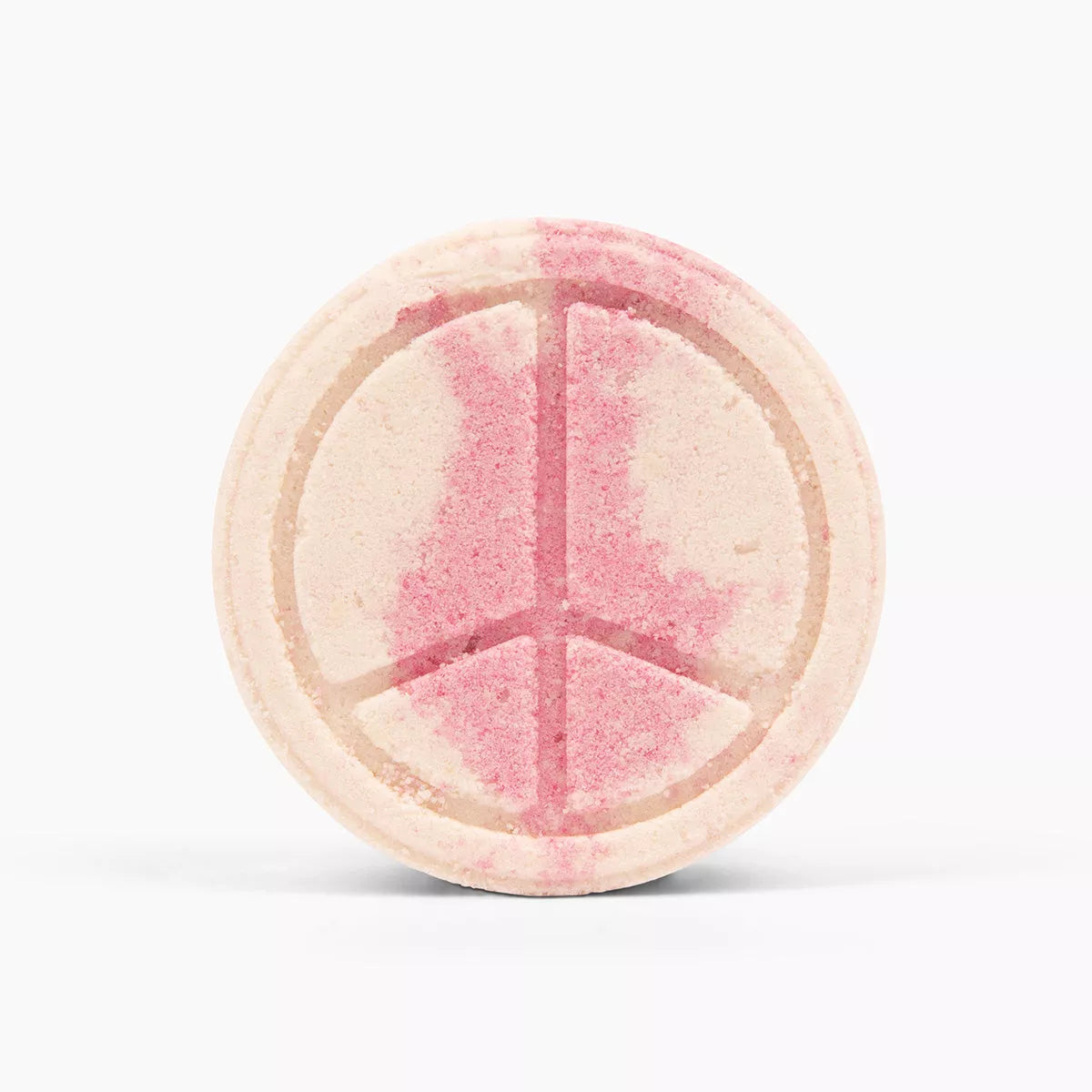 Spinster Sisters Bath Butta' Bomb with patchouli and rose scent, shown in a close-up image highlighting the textured, aromatic bath bomb.