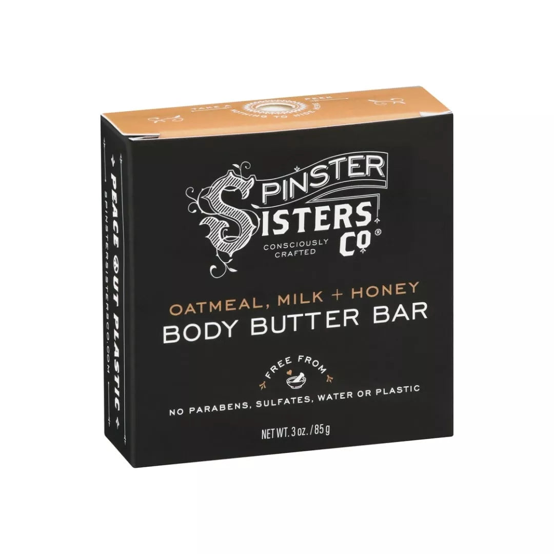 Spinster Sisters Body Butter Bar showing a natural, creamy bar with textured surface and branding, ideal for moisturizing skin.