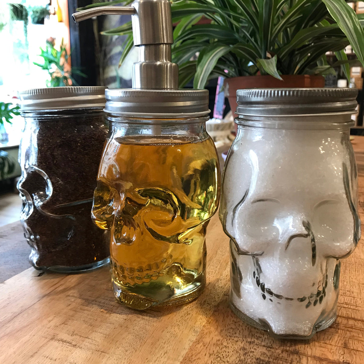 16 oz glass skull mason jar by OTB Refills, featuring a detailed skull design perfect for decorative or beverage use.