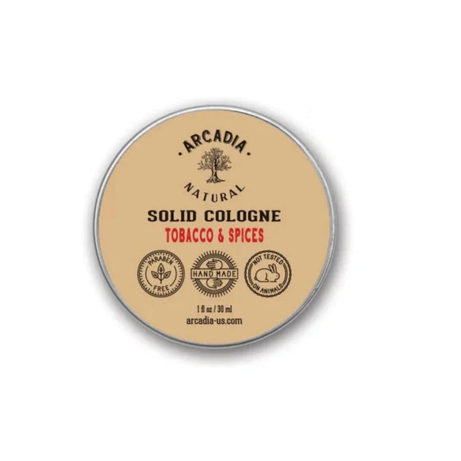 Natural Solid Scents perfume by Arcadia Naturals in a sleek black container, showcasing a smooth, solid fragrance balm.