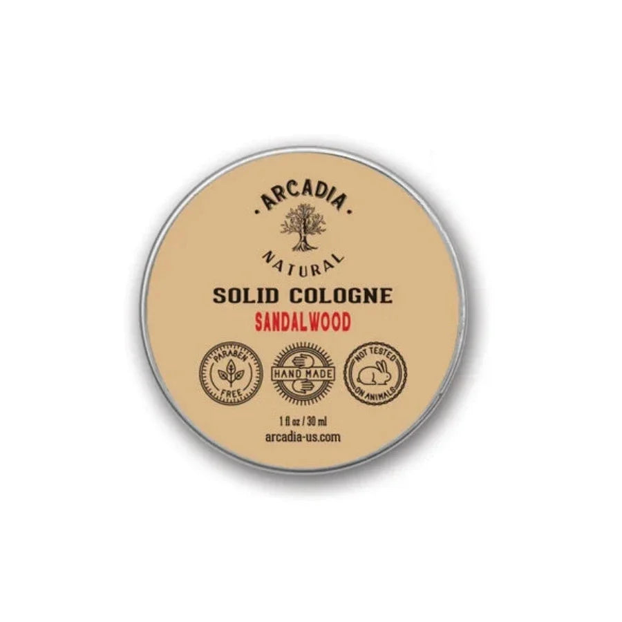 Natural Solid Scents perfume by Arcadia Naturals in a sleek metal tin, featuring a smooth, solid fragrance balm.