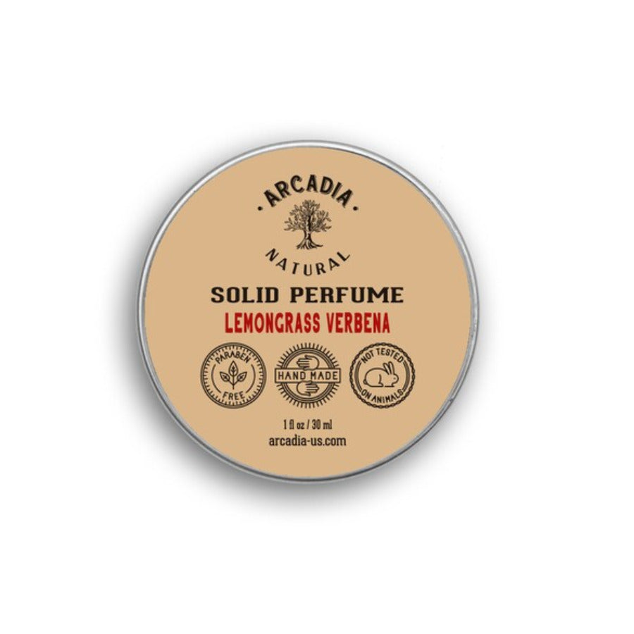 Natural solid perfume by Arcadia Naturals, showing a sleek container with a smooth, creamy solid fragrance inside.