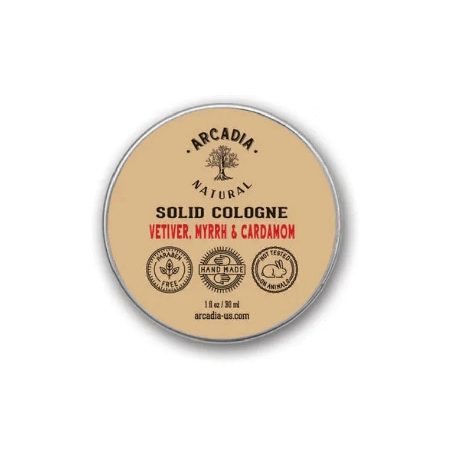 Natural solid perfume by Arcadia Naturals in a sleek container, showcasing earthy tones and elegant packaging.