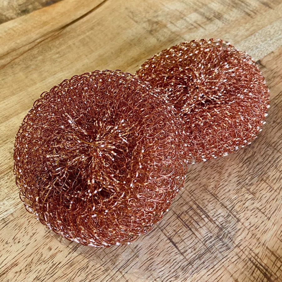 OTB Refills copper scrubber scouring pad for cleaning pots, pans, and cookware with durable, abrasive surface.