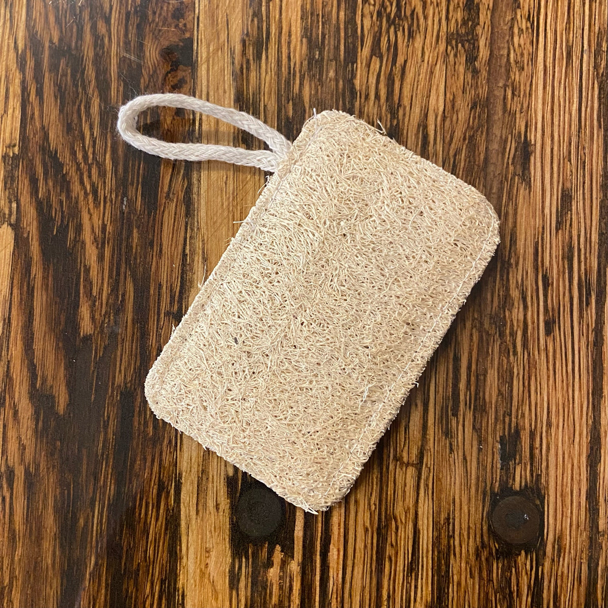 Natural loofah scrubber sponge pads from OTB Refills, showing textured natural fiber exfoliating pads for cleaning and bathing.