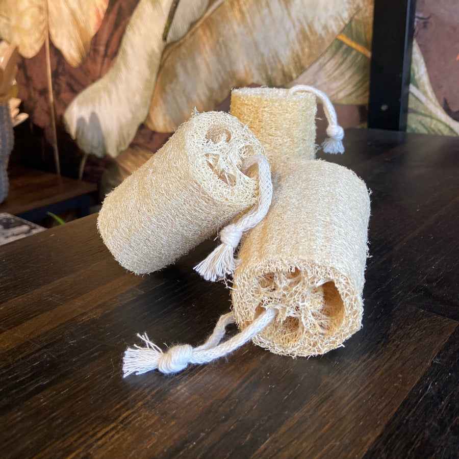OTB Refills natural loofah exfoliating sponge showing textured surface for gentle skin exfoliation and cleansing.