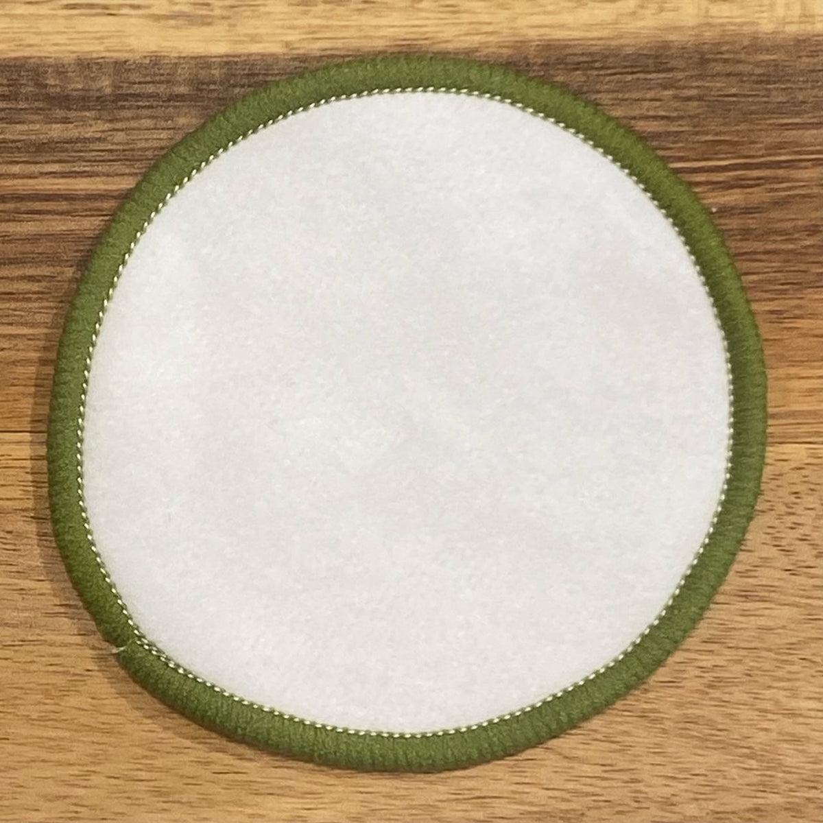 OTB Refills makeup remover pad showing soft, reusable fabric for gentle facial cleansing and makeup removal.