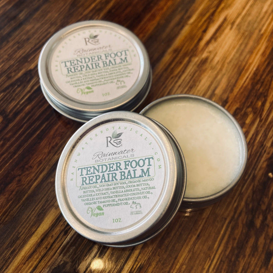 Rainwater Botanicals Tender Foot Repair Balm jar with natural ingredients, smooth balm texture, and soothing packaging.