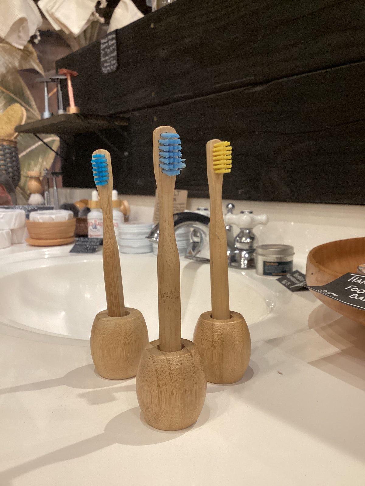 Kids bamboo toothbrush by OTB Refills with soft bristles and eco-friendly bamboo handle, suitable for children.