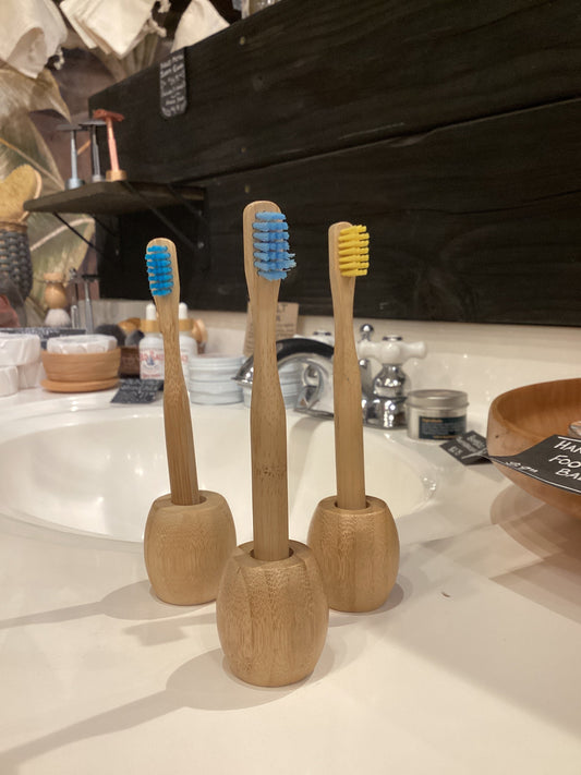 Kids bamboo toothbrush by OTB Refills with soft bristles and eco-friendly bamboo handle, suitable for children.