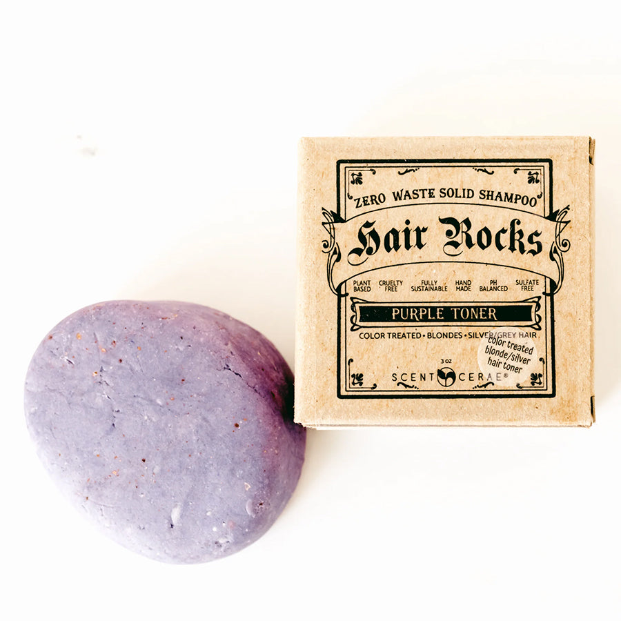 ScentCerae Hair Rocks natural shampoo bar in purple rock shape, eco-friendly hair care product with vibrant purple coloration.